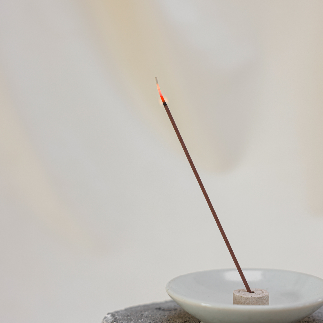 incense stick in incense holder